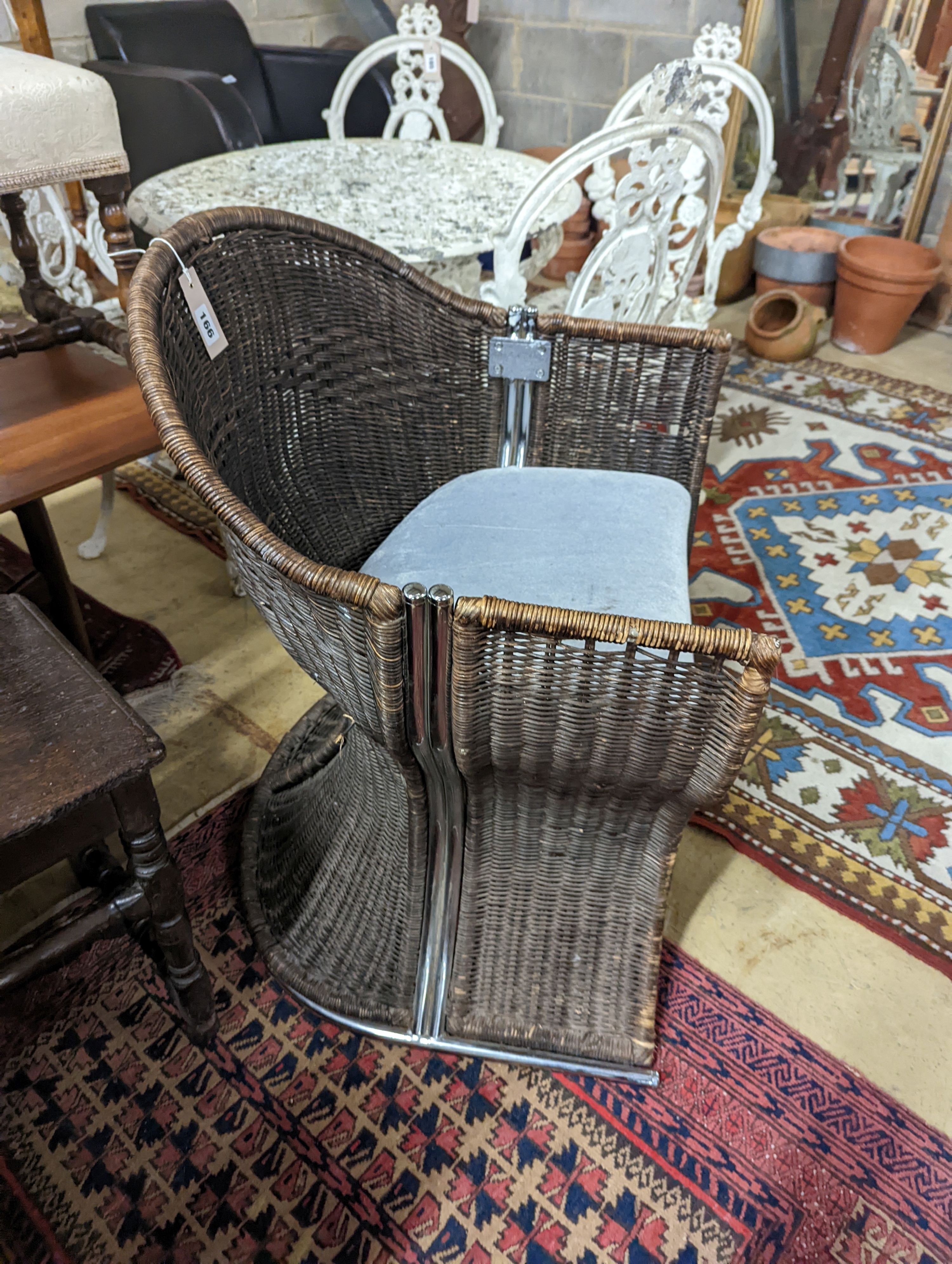 A rattan and chrome conservatory chair, width 60cm, depth 50cm, height 73cm